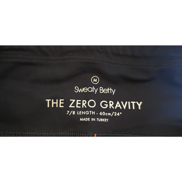 Sweaty Betty Zero Gravity Pocket Leggings Medium 7/8 Black Neon Tropical NWT - Picture 4 of 9